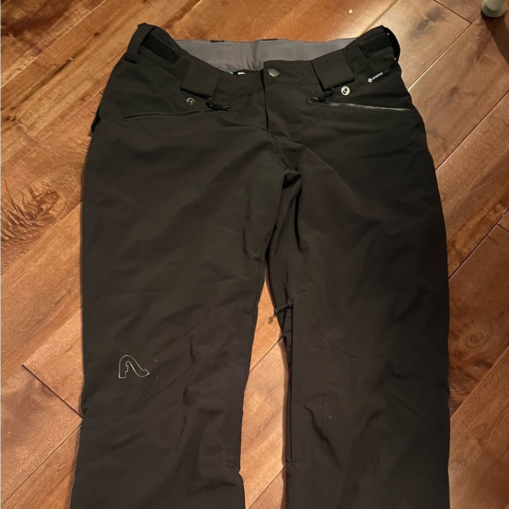 Black Flylow women’s ski and snowboard pants.  Size large.  In great shape.